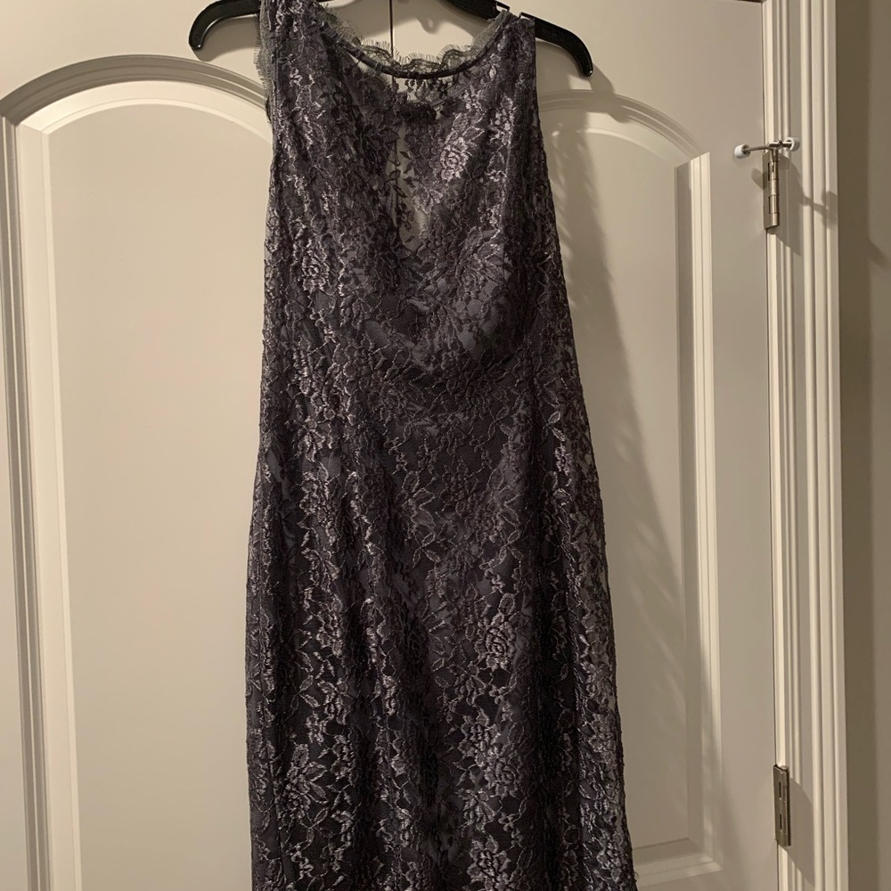Beautiful gray cocktail dress with built in shelf bra with lace overlay.